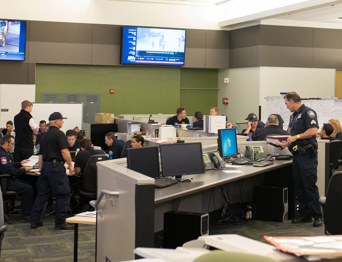 Image of a regional medical operations center showing representatives from different EMS agencies and health care entities working together.